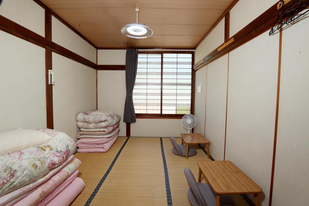 Guest House Shikotsu Kamui تشيتوسي الغرفة الصورة